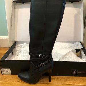 Brand new INC boots with box size 5